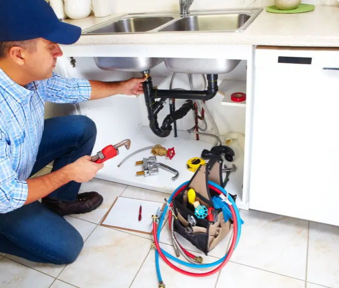 Plumbing 1 Magic Touch Handyman Plumber working